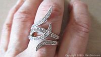Ring worn on finger showing design and fit