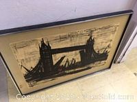 Full view of framed painting leaning against wall
