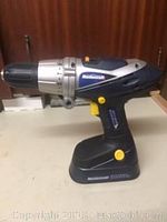 Side view of Mastercraft cordless drill showing drill chuck, and handle