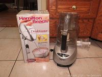 Photo of Hamilton Beach DrinkMaster in box and Cuisinart food processor on floor