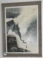 Front view of framed print showing full composition, mat, and metal frame