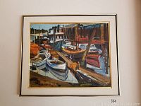 Full view of framed oil painting showing boats moored at a dock