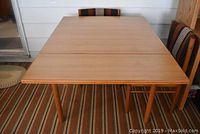 Table assembled with two leaves installed, top-down view