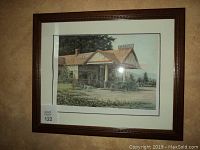 Full view of framed art print "Lone Pine" in dark wood frame with white matte.