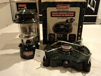 Both Coleman gas lantern and single burner stove shown together with boxes.