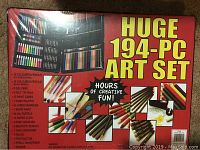 Photo of the front of the art set box showing contents and item count