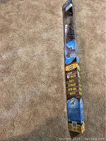 Photo of packaged owl kite showing overall packaging and wingspan label.