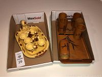 Photo of yellow ceramic ducks, soft boiled egg cups, and salt shaker on a tray