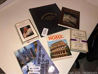 Seven history books arranged showing covers, including a book on Hamilton Wentworth County history.