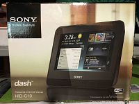 Front box image showing Sony Dash HID-C10 device with touchscreen user interface and WiFi certification.