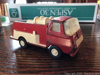Vintage metal Tonka fire truck, red and cream