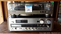 Sony turntable PS4300 stacked on Sony STR 5800 SD receiver, showing front control panels and dust cover closed on turntable.