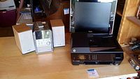 Panasonic 5-disc CD and cassette player with two speakers, Sony 19 inch monitor, and HP Officejet 4630 printer on table