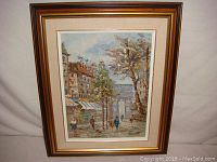 Full view of framed oil painting showing Paris street scene with Arc de Triomphe and pedestrians.