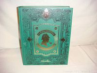 Front cover of the green hardcover Sherlock Holmes limited edition book with embossed gold and black design featuring Sherlock Holmes silhouette.