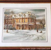 Full view of the framed print of the Prince of Wales Hotel winter scene, showing building, snow, and figures