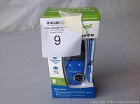 Front angled photo of AccuRelief device box with product partially visible. Shows some product text and logo.