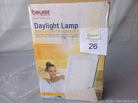 Front of the Beurer daylight lamp box showing product image, brand, and description.