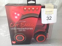 Front view of Hype Cat Ears LED Headphones in original packaging showing red and black headphones with LED lit cat ears.