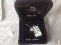 Photo of Gianni Bernini sterling silver cubic zirconia necklace in black presentation box.