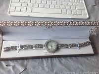 Gianni Bernini sterling silver watch with cubic zirconia in box on keyboard background