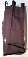 Single brown curtain panel folded showing front side with tab tops.
