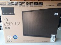 Photo of Insignia 24-inch LED TV box showing model and specifications