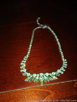 Necklace laid flat showing full length and closure