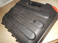 Black and Decker branded hard case closed showing textured surface and logo.