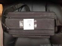 Top view of black Safari camera bag