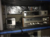 Photo showing full lot including RCA clock, Aiwa cassette deck on top, and Pioneer stereo receiver below