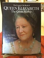 Front cover of the book showing Queen Elizabeth The Queen Mother wearing a tiara and necklace