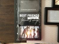 Black Best Friends themed collage picture frame with two 4x6 photo slots and decorative text and silhouette image.