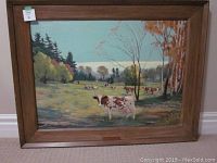 Full frontal view of framed oil painting showing composition with cattle and lot sticker.