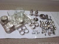 Full assortment including tea tray, glass holders, shrimp glasses, napkin rings, salt and pepper shakers, tea receptacles and spoons