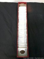 Long collector's box filled with numerous individually labeled holders containing Germany 5 Pfennig coins dating from 1874 to 1984.