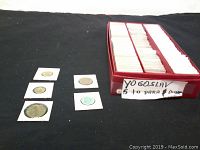 Overview of the collection of Yugoslav coins in 2x2 holders and boxes