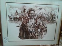 Framed print showing 'Chief Joseph Man of Peace' with Native American group and teepees in background.