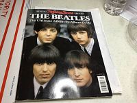 Cover of the Rolling Stone special edition magazine The Beatles Ultimate Album Guide showing all four Beatles members on the cover.