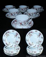 Set of 5 teacups with saucers arranged in a triangle, also showing 6 salad plates stacked