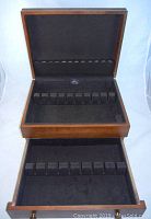 Open walnut flatware box showing two felt-lined compartments designed to hold flatware securely.