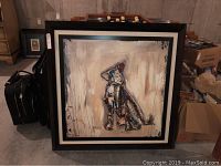 Full view of the framed painting showing the abstract dog and the frame size.