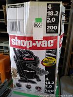 Original box of Shop Vac 4 gallon wet dry vacuum with specifications printed on the box.