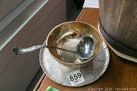 Photo showing Birks sterling bowl inside the aluminum tray, with hinged Rogers 1881 ladle resting on the edge.