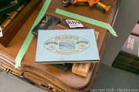 Top view showing boxed set of 4 CH. Loonen French Ivory brushes with blue box and gold lettering.