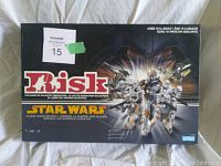 Front view of the Risk Star Wars Edition board game box showing branding and theme.