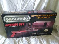Nintendo Entertainment System Action Set original retail box front showing product and accessories.