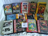 Wide shot of all Genesis and 32X game cases displayed on white backdrop