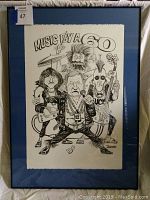 Full view of framed black and white cartoon artwork 'Music By A 60' by Andy Donato with blue matte and paper texture visible.