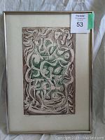 Full framed numbered print of abstract female figures in beige and green